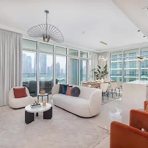 Elegant Seaside Living 3-bedroom Emaar Beachfront By Suiteable *