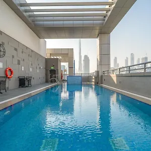 Elegant 2br New & Canal & Burj Views & Pool & Gym Апартаменты